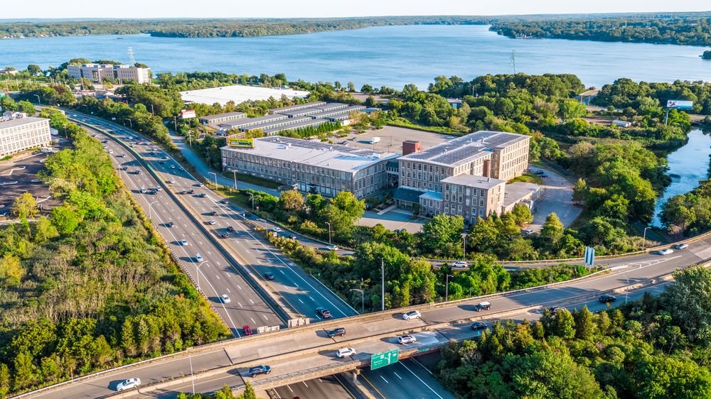 Clover Leaf Mills today with rooftop solar at the I-195 and Route 24 interchange